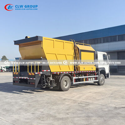 Sinotruk HOWO 4x2 Synchronous Chip Sealer with PLC Control and Large Insulated Asphalt Tank for Durable Pavement Preservation
